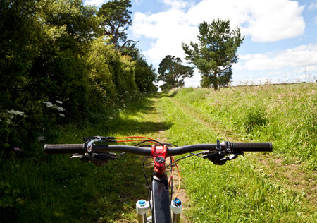 Mountain bike handle bars on a country trail