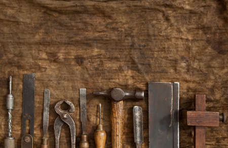 Old woodwork tools on grungy rag backgroundの写真素材