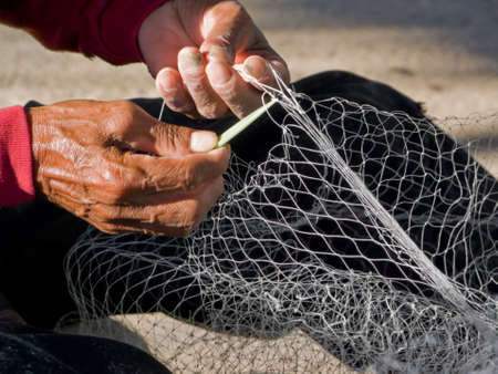 Fishing Net Repairの写真素材