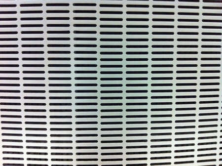 Repeated pattern of air-conditioning holesの素材