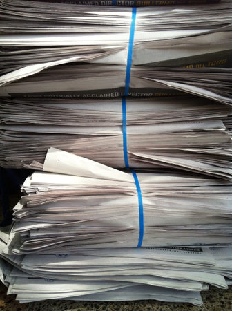Stack of unused newspapersの素材