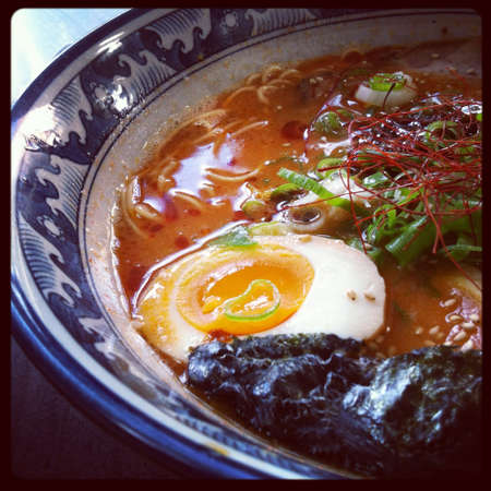 Japanese original fire spicy ramen noodle with half boiled eggの素材