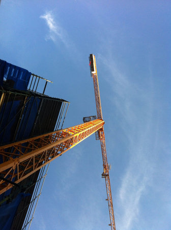 Crane of construction site in property market boom