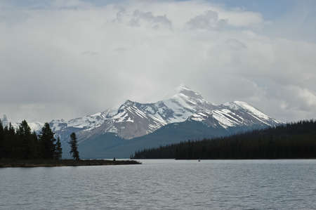 snow mountain and calm lakeの写真素材