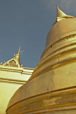 Golden stupa and blue sky in Bangkok Thailandの写真素材