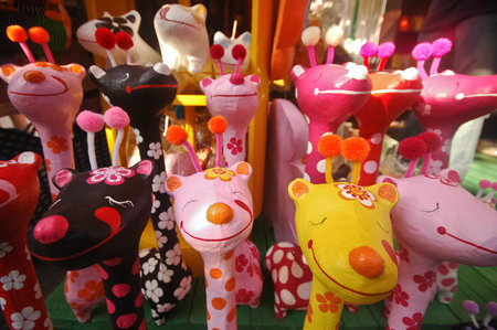 Colourful happy giraffe wooden doll in Thailandの写真素材