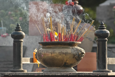 bucket of fragrance sticks in Chinese temple