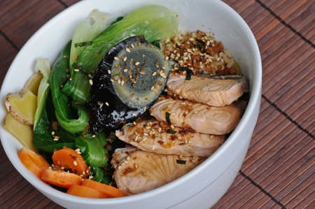 Japanese salmon sesame salad with black eggの写真素材