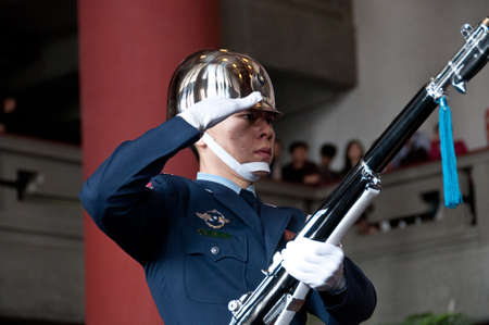 Taipei Taiwan  February 3 2015: Guards are changing at Sun Yat Sen Memorial hall in Taipei Taiwan. This photo is taken in the morning shift inside the central section of the hall.のeditorial素材