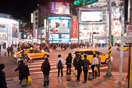 Taipei Taiwan  February 3 2015: Ximending shopping district in Taipei Taiwan. There are many tourists and local people walking around during night time.のeditorial素材