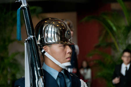 Taipei Taiwan  February 3 2015: Guards are changing at Sun Yat Sen Memorial hall in Taipei Taiwan. This photo is taken in the morning shift inside the central section of the hall.のeditorial素材