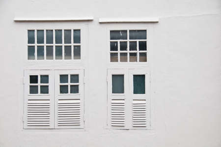 White classic window on white wallの写真素材