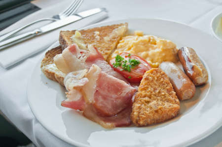 Big breakfast on white plateの写真素材