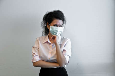 Business woman wear hygiene mask and sickの写真素材