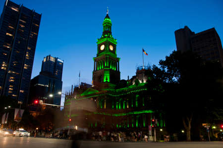 Light moving of bustling city center scene with old clock tower in Sydneyの写真素材
