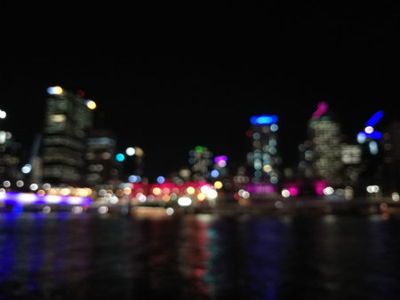 Defocused scene of night light from Brisbane Australia riverbank city scape sceneの写真素材