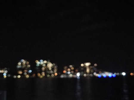 Defocused abstract scene of multiple light of city scape at night backgroudの写真素材