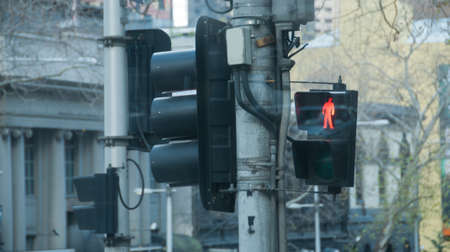 Red traffic light pole in Winter in Melbourne Australiaの写真素材