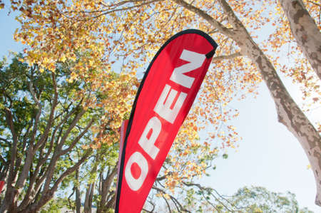 Red Open House for Sale/Rent signage in Autumnの写真素材