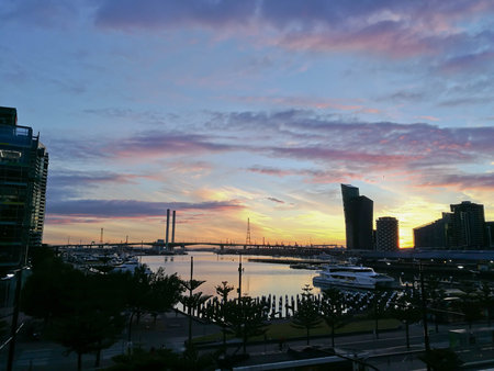 MELBOURNE, AUSTRALIA - JULY 26, 2018: Sunset panorama scene of docklands marina harbour in Melbourne Victoria Australiaの写真素材