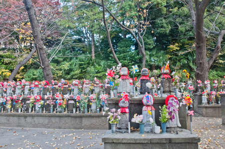 TOKYO, JAPAN - DECEMBER 1, 2018: Scene of wind turbine papers to worship souls of children in the back park of Zojo-ji Buddhist famous temple built from 1622. There is nobody in the photo.のeditorial素材