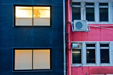 Contrast colour scene of blue and pink building walls in Hong Kong China SAR in the evening
