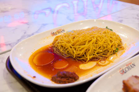 MELBOURNE, AUSTRALIA - JULY 26, 2018: Famous golden egg noodle Hawker Chan Michelin star restaurantのeditorial素材