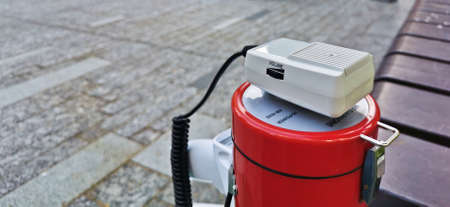 Red electronic megaphone speaker for protestor lays outdoorの写真素材