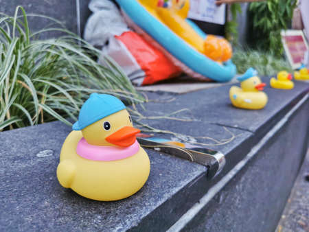 BRISBANE, AUSTRALIA - NOVEMBER 29, 2020: Group of yellow rubber ducks represents a sympbol of innocent people in the peacefully rally at King George Square, City Hall, in Brisbane Australia to protest the dictatorship of the prime minister Prayuth Chan-ocのeditorial素材