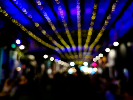 Defocused abstract blurred background scene of light random pattern in a concert hall