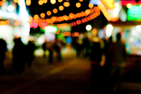 Abstract random colourful defocused blurred background pattern night life of local marketの写真素材