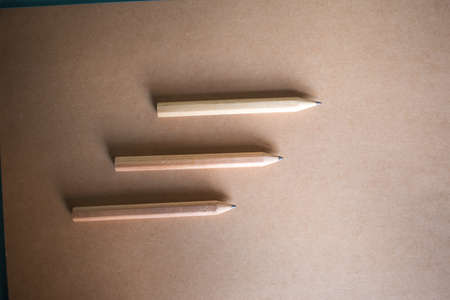 Three pencils on recycle notebookの写真素材