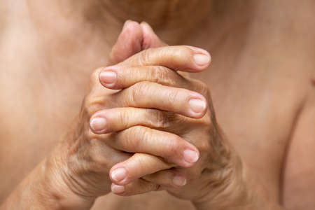 Senior woman's hands praying, Close up, Body language feelingの写真素材