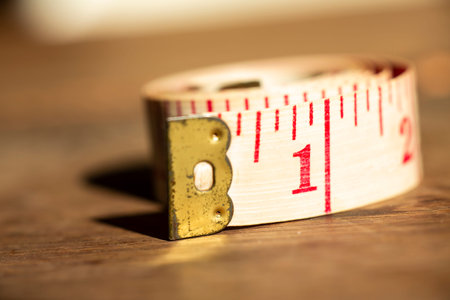 Tape measure on wood texture background, Close up & Macro shot, Selective focusの写真素材