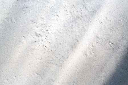 Abstract rough concrete texture background, White painted colour, Close up & Macro shot, Light & Shadow, Interior home conceptの写真素材