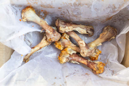 Seven Chicken Bones in Leg with white facial papers in  the box, Abstract backgroundの写真素材