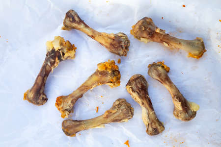 Seven Chicken Bones in Leg with white facial papers in  the box, Abstract backgroundの写真素材