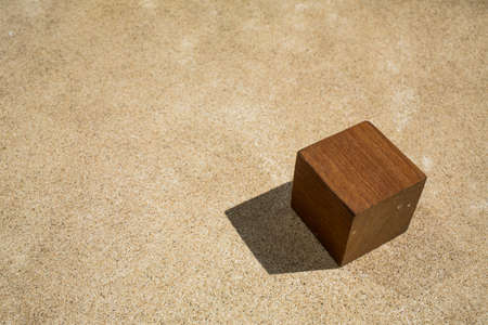 wooden square on cementの写真素材