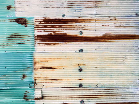 Rusty Corrugated metal texture or Galvanized iron steel texture, Beige colour and Green Colour, Abstract Backgroundの写真素材
