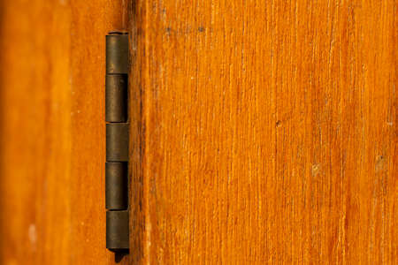 Table hinge on wooden table, Close up & Macro shot, Selective focusの写真素材