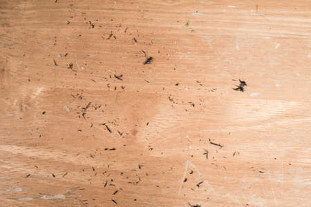 Piece of eraser on wooden background, Close upの写真素材