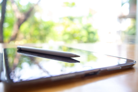 Bangkok Thailand - March 02, 2019 : Blurred Apple pencil with Black tablet computers iPad Pro on...