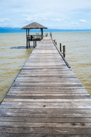 Wooden bridge to the sea, Gulf of Thailandの写真素材