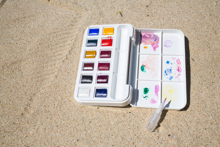 Watercolor box on beach backgroundの写真素材