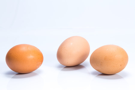 Three eggs isolated on white backgroundの写真素材