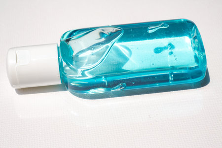 People's hands using wash hand sanitizer gel pump dispenser with alcohol gel sanitizer on white, Close up&Macro shot, Select focus, Prevention from covid19, Bacteria, Healthcare, 7 step wash handの写真素材