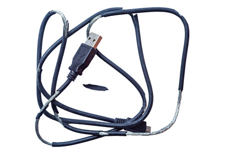 Damaged black usb cable plug and micro usb plug or Old Smart Phone Charger Cable broken on white...