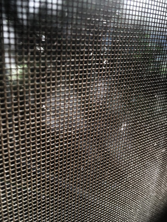 Dust and Dirty mosquito wire screen window, Close up and macro shot, Cleaning home concept