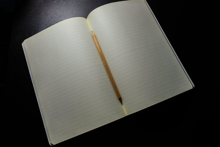 Blank page of note book for writing the new things with pencil