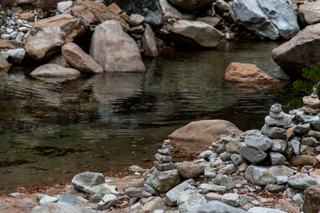 Closeup of water flowing over rocks in a stream of the Autumn Valley